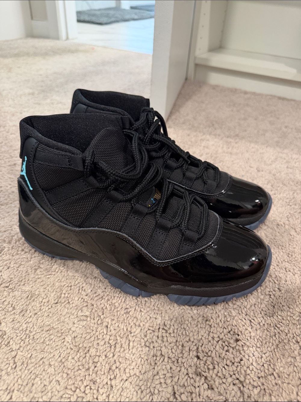 Jordan High-Top Sneakers in Black with Teal Accents Gamma Blue